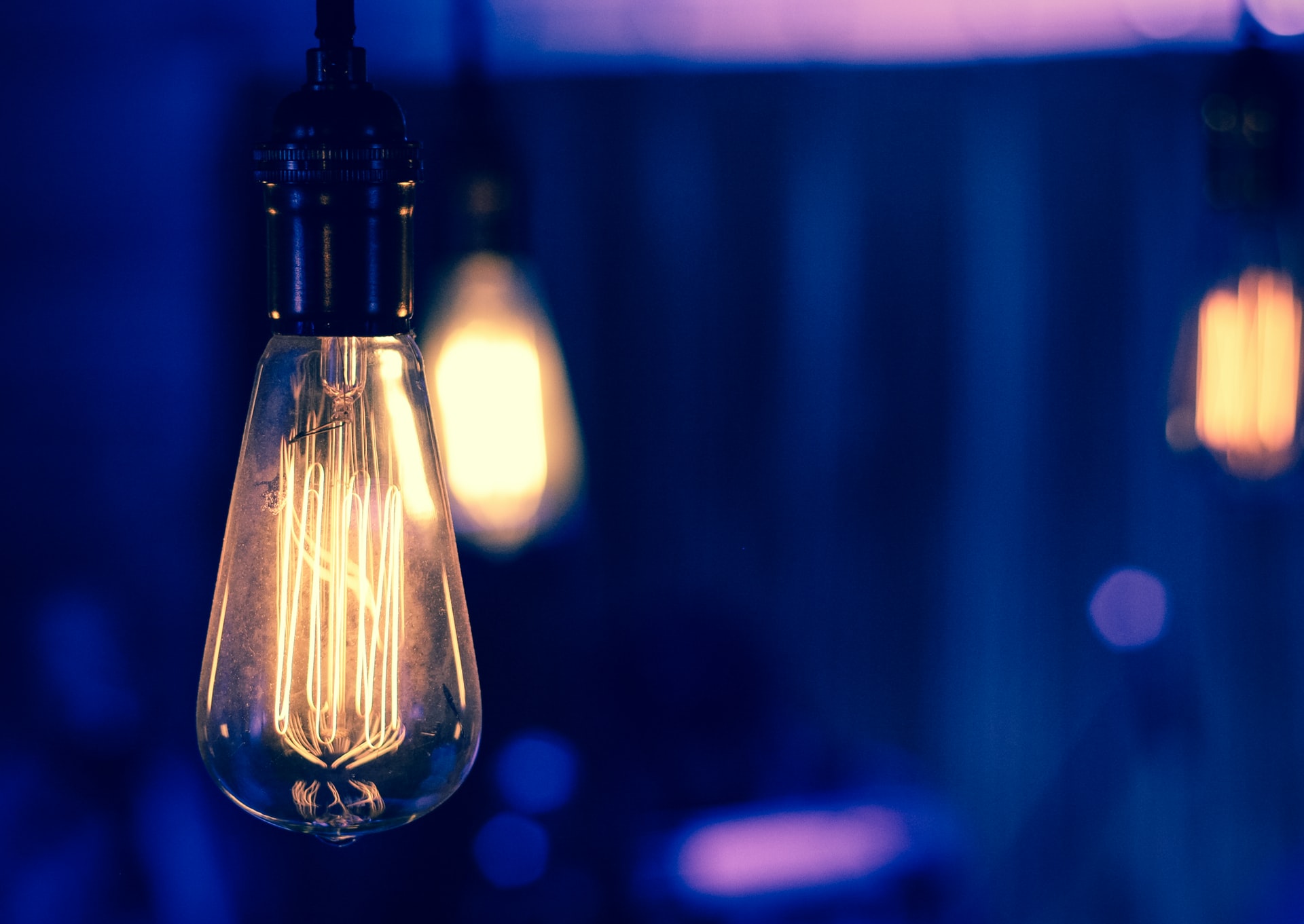 A light bulb hangs from the cieling